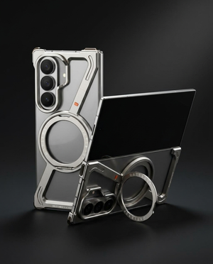 Luxury tech product photography of a Samsung Galaxy Z Fold premium metal case on a deep dark charcoal background — the editorial mood for the question of whether metal cases are good for foldables