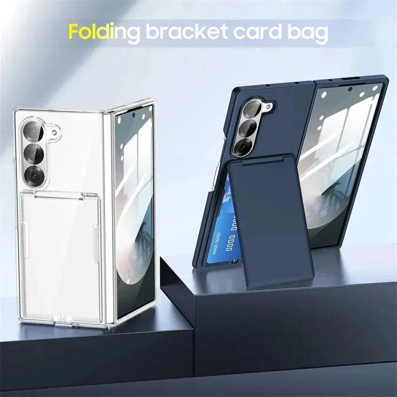 Two foldable bracket card bag phone cases, one clear and one black, holding smartphones with triple cameras